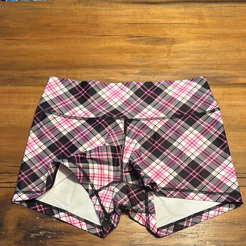 Pink and Black Athletic Shorts with Bold Plaid Design